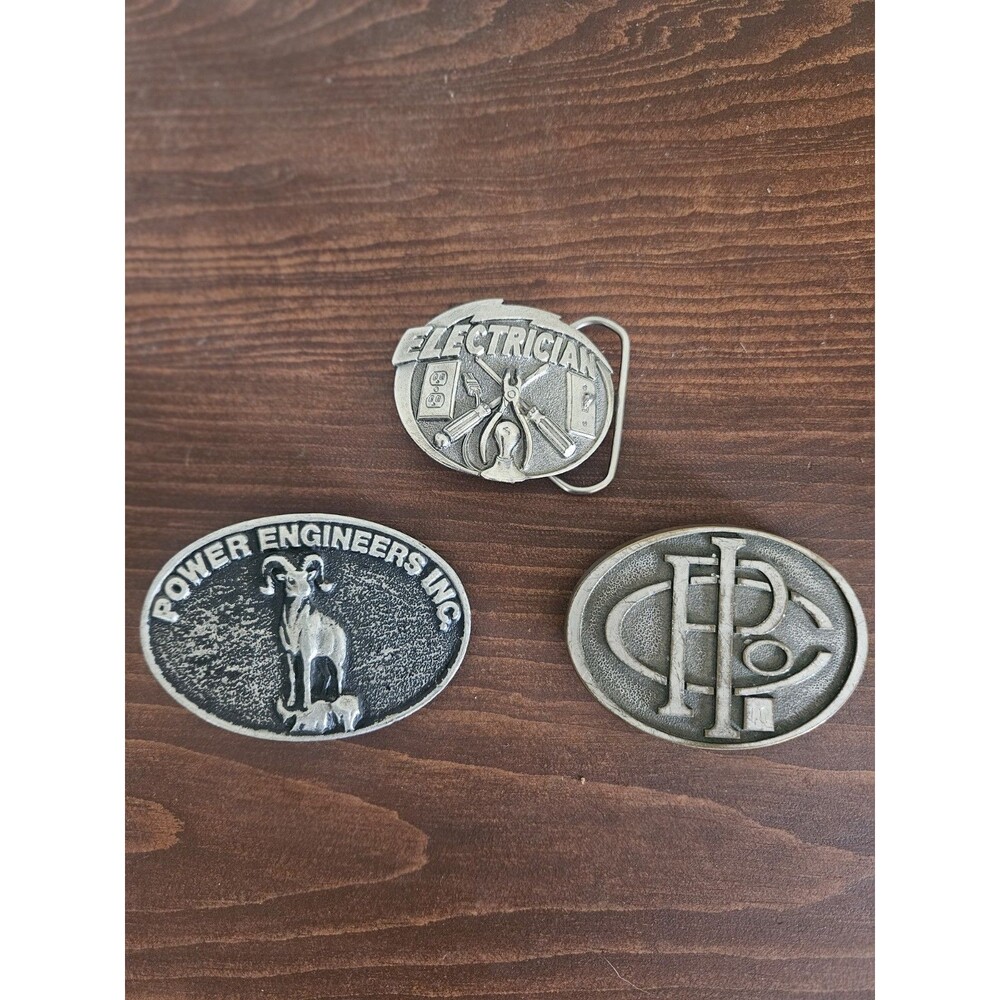 Three Vintage Industrial Belt Buckles Electrical Trade